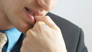 lovepik businessman biting his nails picture 501498474